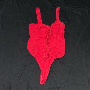 Red body suit